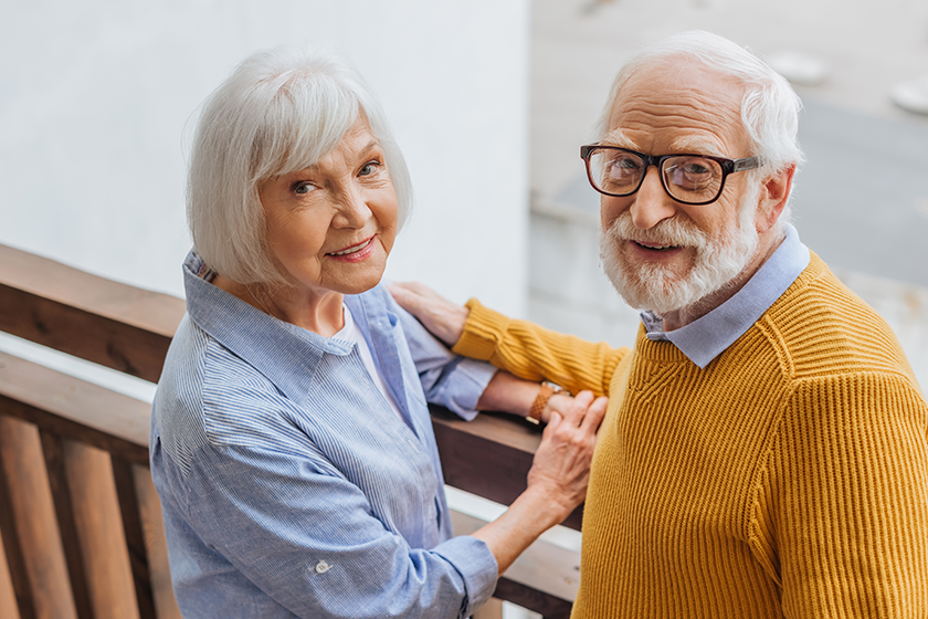 high-angle-view-smiling-senior-couple